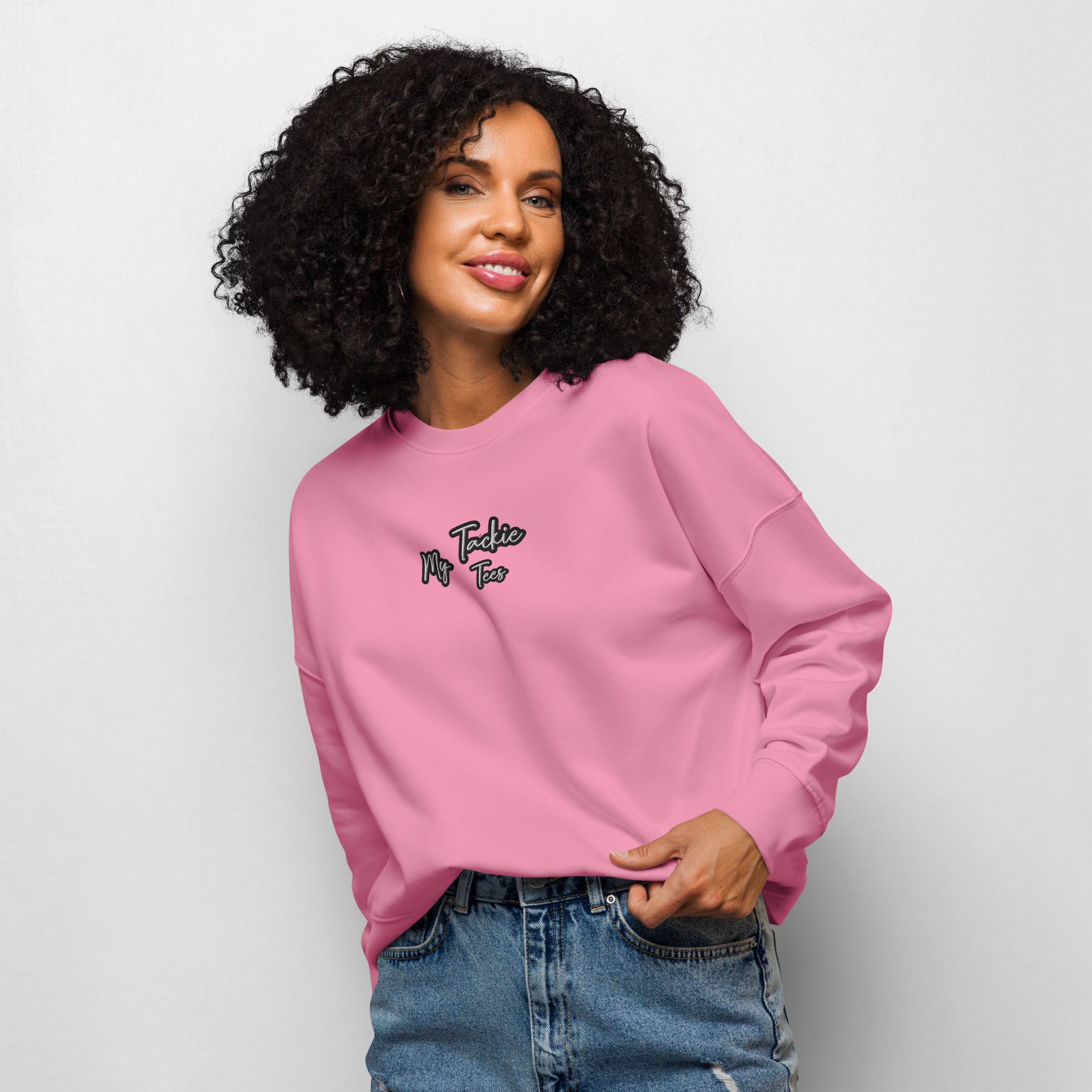 Women's organic crew neck sweatshirt with embroidered design - front view