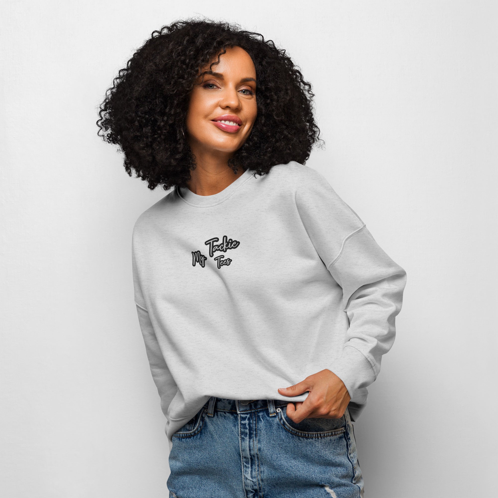 Women's organic crew neck sweatshirt with embroidered design - front view