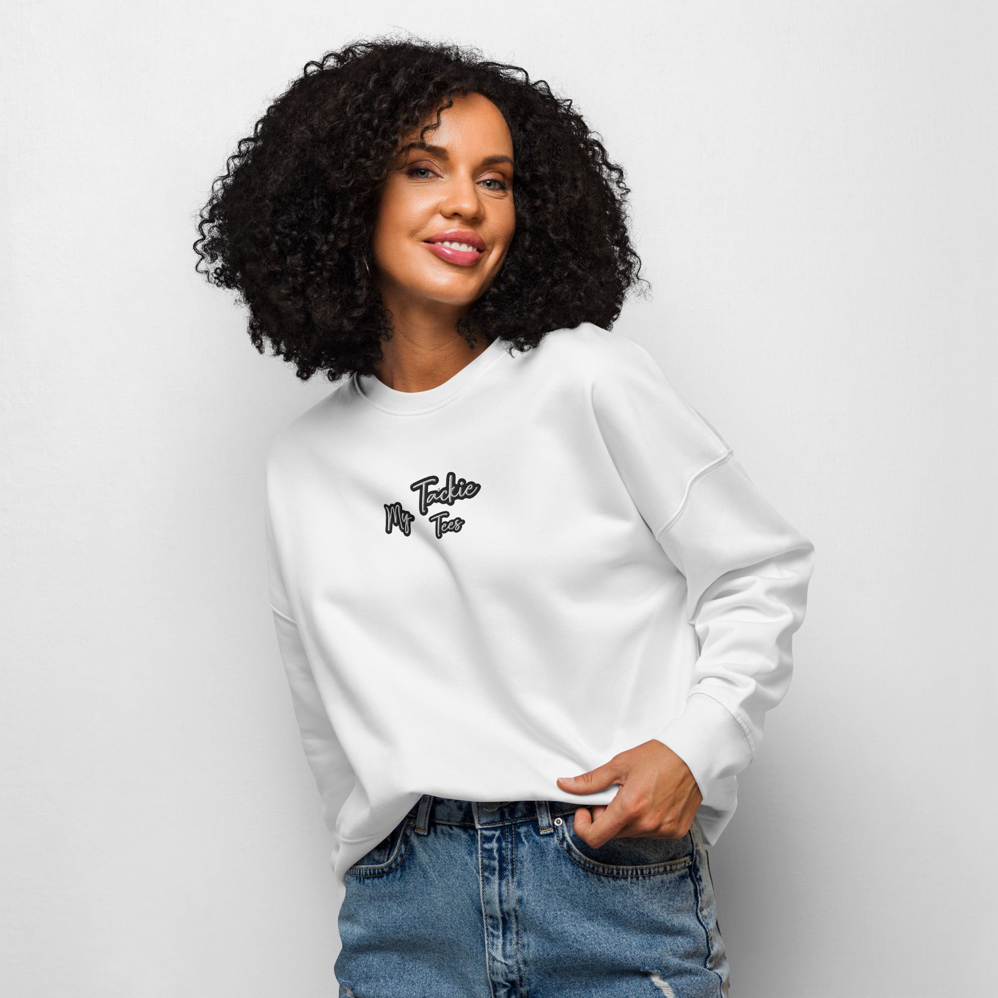 Women's organic crew neck sweatshirt with embroidered design - front view