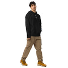 Man wearing Under Armour® x Signature embroidered fleece hoodie with relaxed fit, showcasing comfort and style for athletic and casual wear.